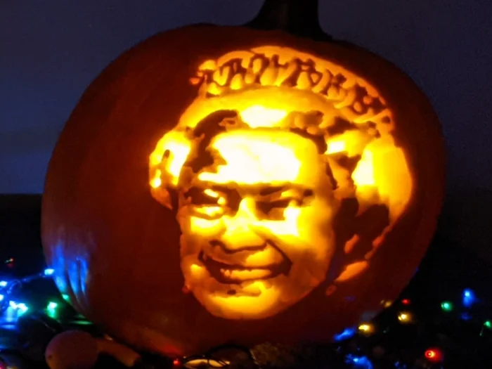 Portrait pumpkin carving created using the scrape, saw and sculpt technique