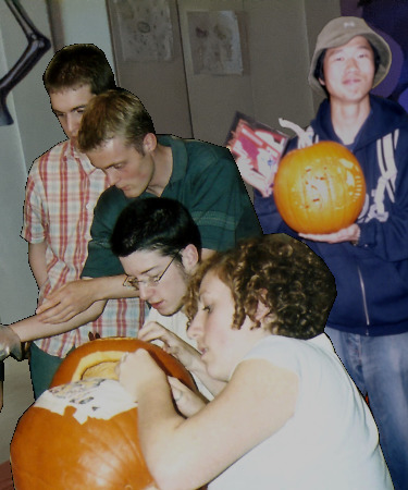 Teens carving pumpkins